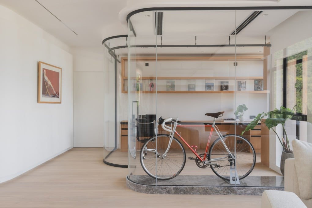 A bicycle takes centre stage at this Repulse Bay, Hong Kong, flat designed by New Office Works. Photo: courtesy New Office Works