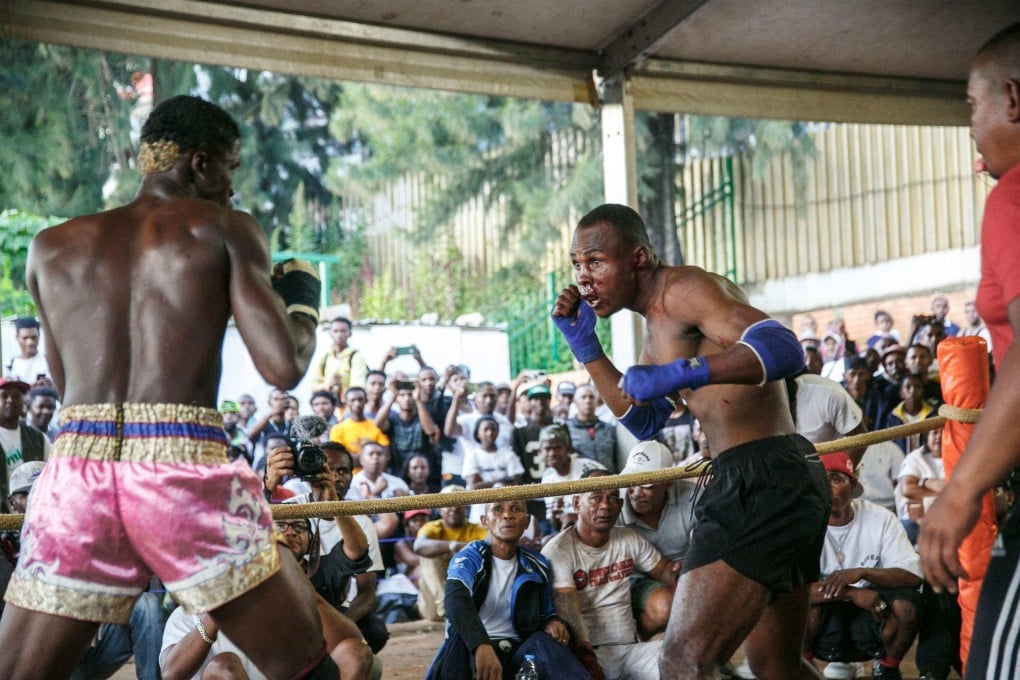 Practitioners of the martial art Moraingy square up during a bout in Antananarivo, Madagascar. An enthusiast for the sport hopes to professionalise it by bringing interested parties together to write some rules. Photo: AFP
