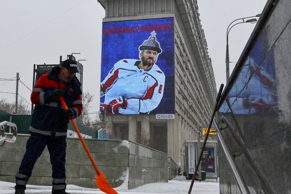 Alexander Ovechkin is seen on a screen in Moscow on Monday in celebration of his 895th career NHL goal. Photo: Reuters