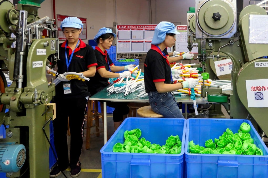 Employees work on a production line for children’s toys at a factory in Jiangxi province. Beijing has urged solidarity across the country after authorities unleashed a series of countermeasures against US tariffs on Friday. Photo: Reuters