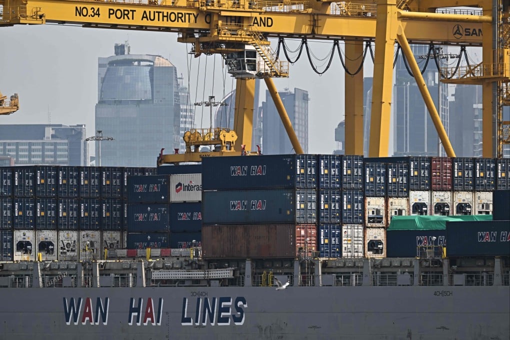 A container ship at the port of Bangkok. Donald Trump’s tariffs on imports into the US could push many countries into recession. Photo: AFP