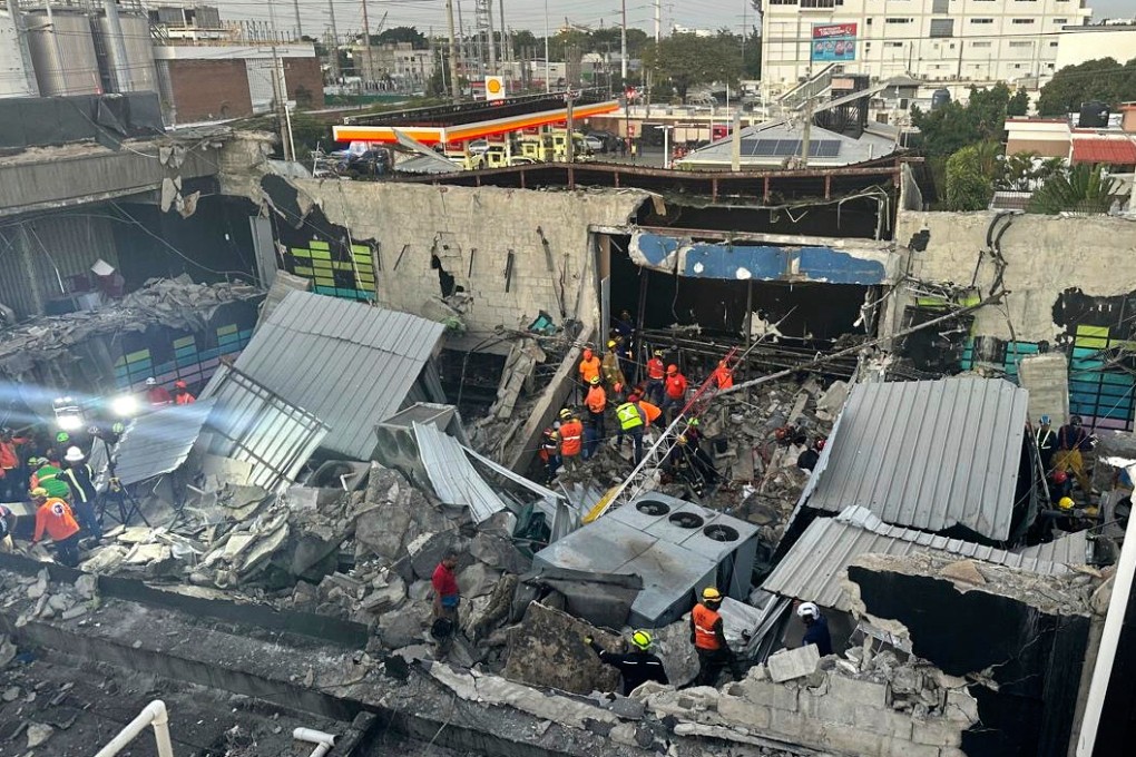 Rescue workers search for survivors at the Jet Set nightclub after its roof collapsed during a concert on Tuesday. Photo: AP
