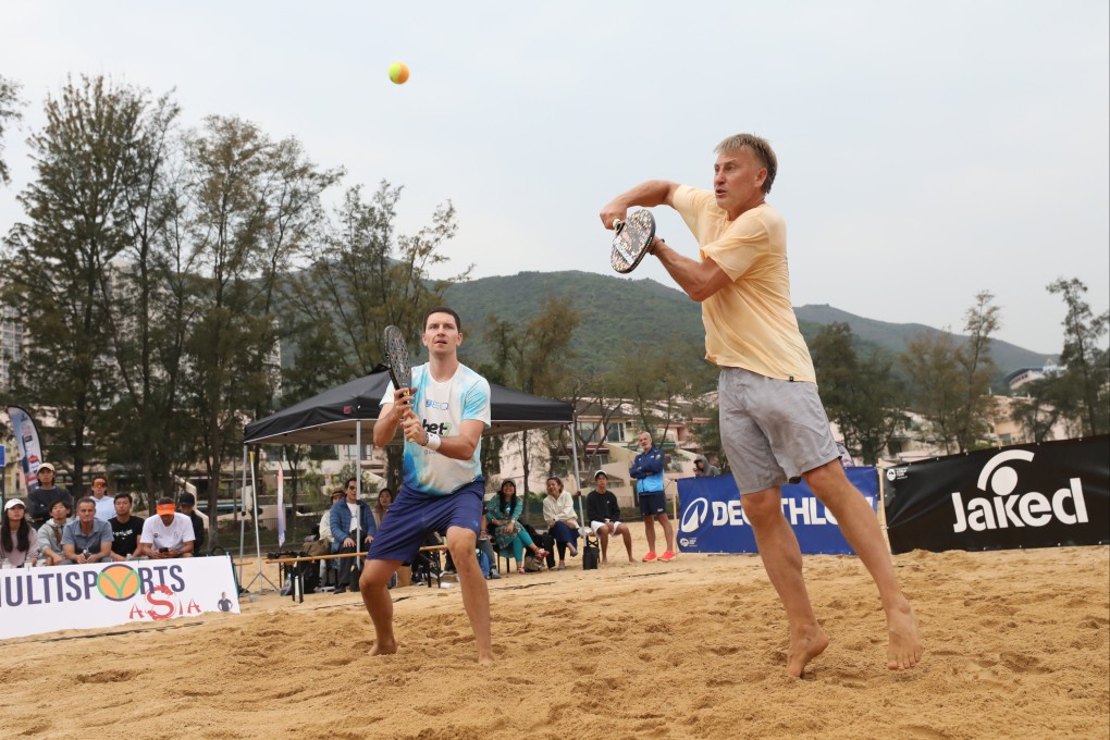 Latvia’s Maksimilians Niklass Andersons (left) and Malta’s Sergey Gvardeitsev winning the men’s doubles final of Beach Tennis Hong Kong at Discovery Bay. Photo: Sun Yeung