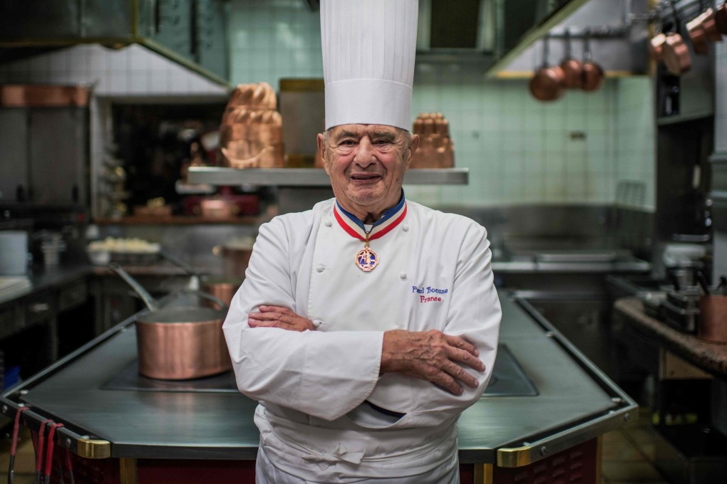 French chef Paul Bocuse stands in his kitchen at Restaurant Paul Bocuse, in Collonges-au-Mont-d’Or, France, during a culinary workshop on November 9, 2012. Photo: AFP