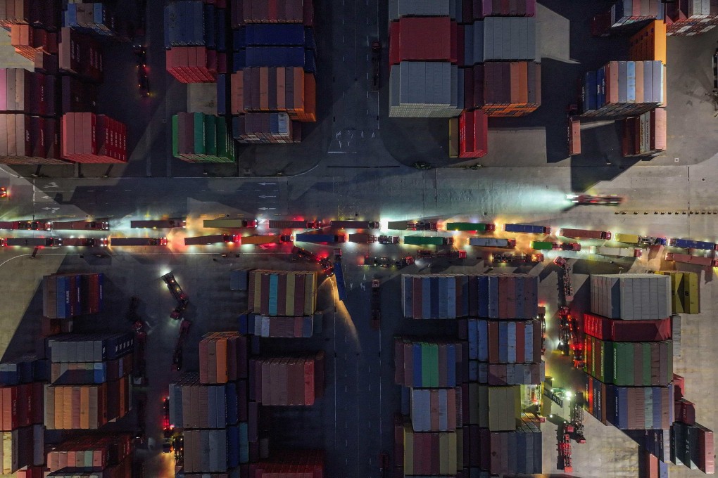 Trucks and shipping containers are seen at a port in Nanjing, in eastern China’s Jiangsu province on April 8. Photo: AFP