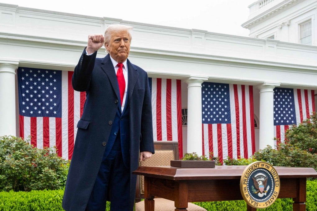 US President Donald Trump pumps his fist after announcing reciprocal tariffs on American trade partners at the White House in Washington on April 2. Photo: AFP