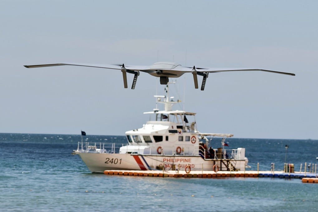 A drone hovers above a Philippine coastguard patrol vessel during a handover ceremony in Bataan province on Tuesday. Photo: EPA-EFE