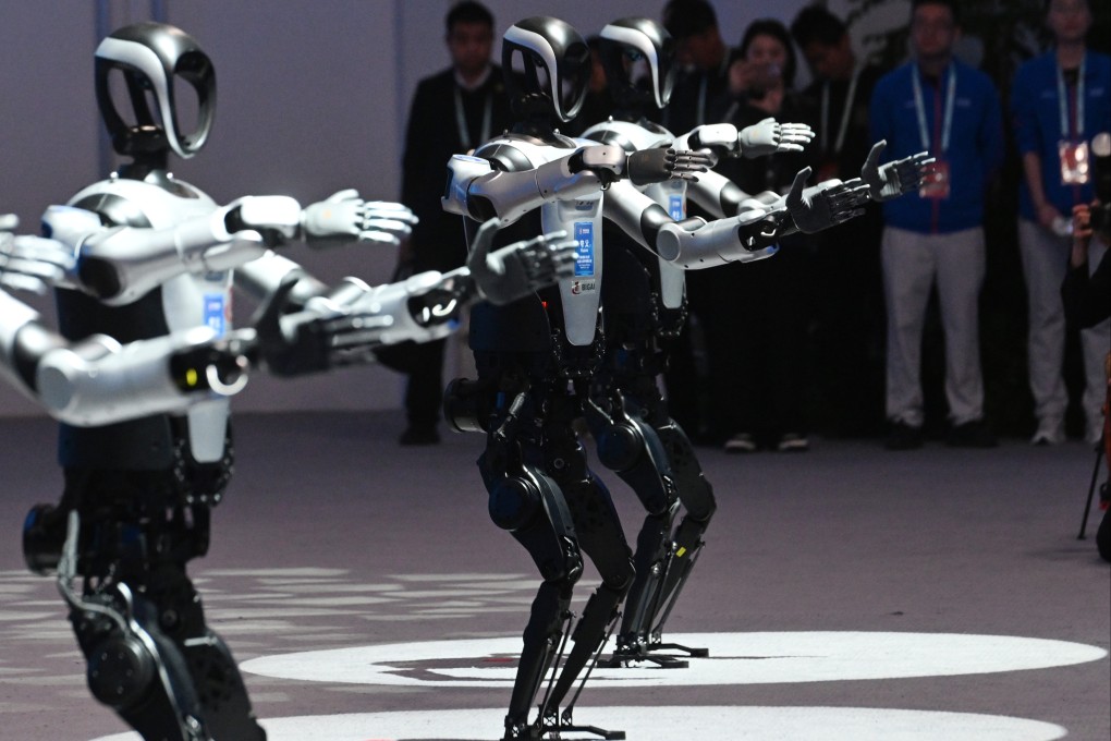 Humanoid robots perform at the opening ceremony of the 2025 Zhongguancun Forum Annual Conference in Beijing on March 27. Photo: Xinhua