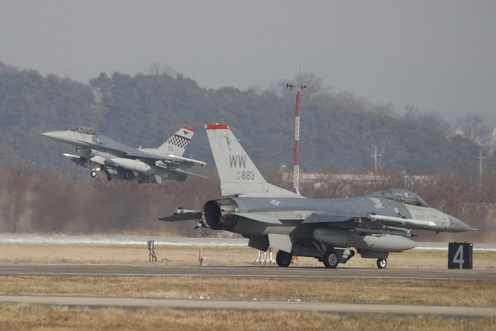 US Air Force F-16 fighter jets take part in joint aerial drills at Osan Air Base in Pyeongtaek in 2017. Photo: AFP