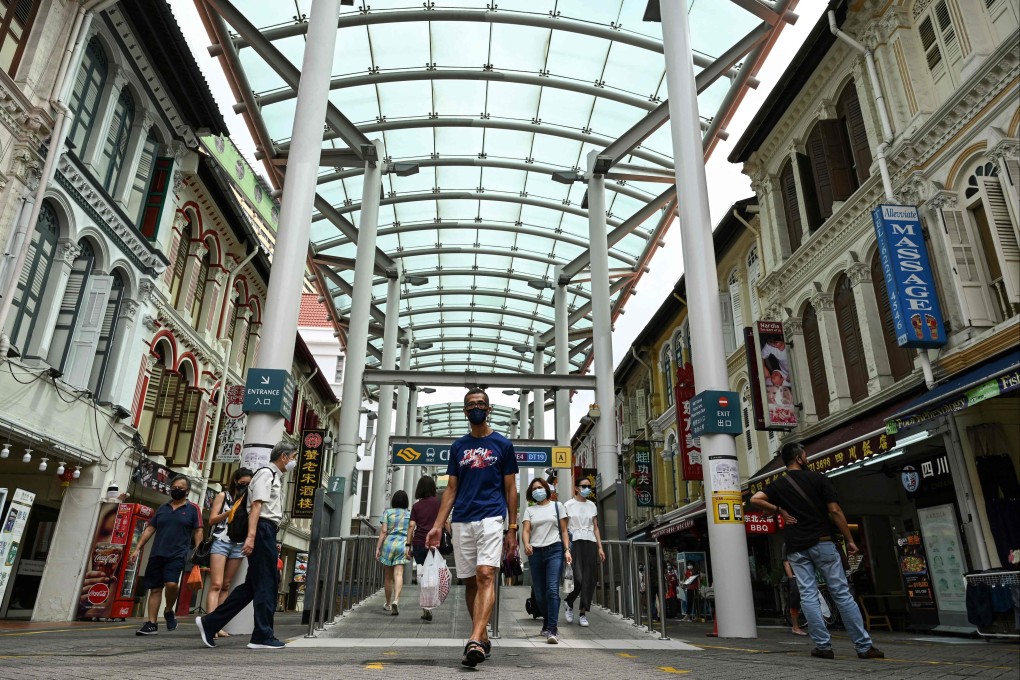 Singapore’s Chinatown. A restaurant in the area has removed signs imposing a “104 per cent surcharge” on American customers. Photo: AFP