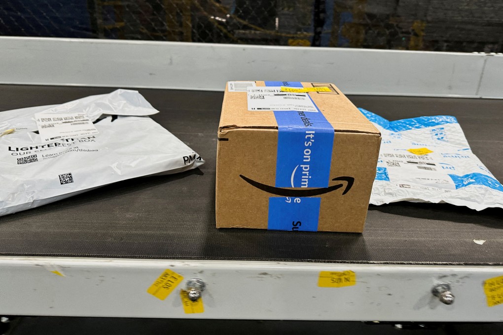 Packages are transported on a conveyor belt at an Amazon warehouse in Melville, New York. Photo: Reuters