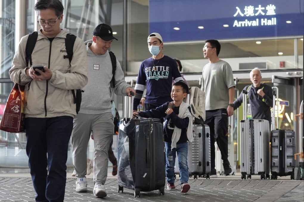 Commuters at the Hong Kong-Zhuhai-Macau Bridge in Chek Lap Kok. Last year, 4,214 travellers with a fever were identified by border health monitoring system. Photo: Eugene Lee
