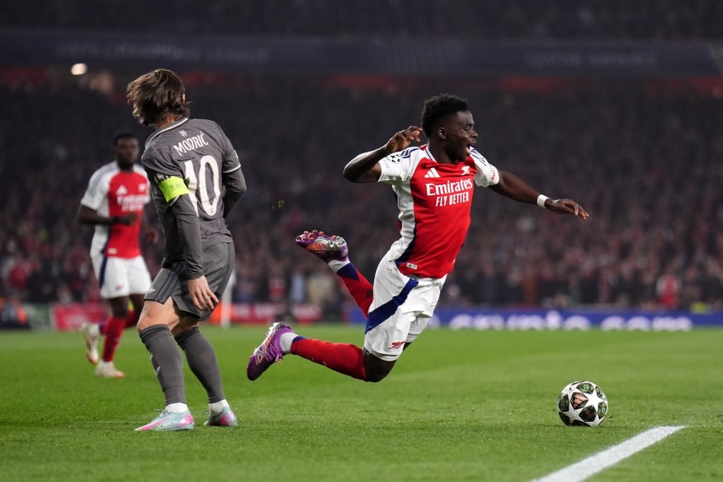 Arsenal’s Bukayo Saka (right) limped off in the win over Real Madrid and could start off the bench this weekend. Photo: dpa