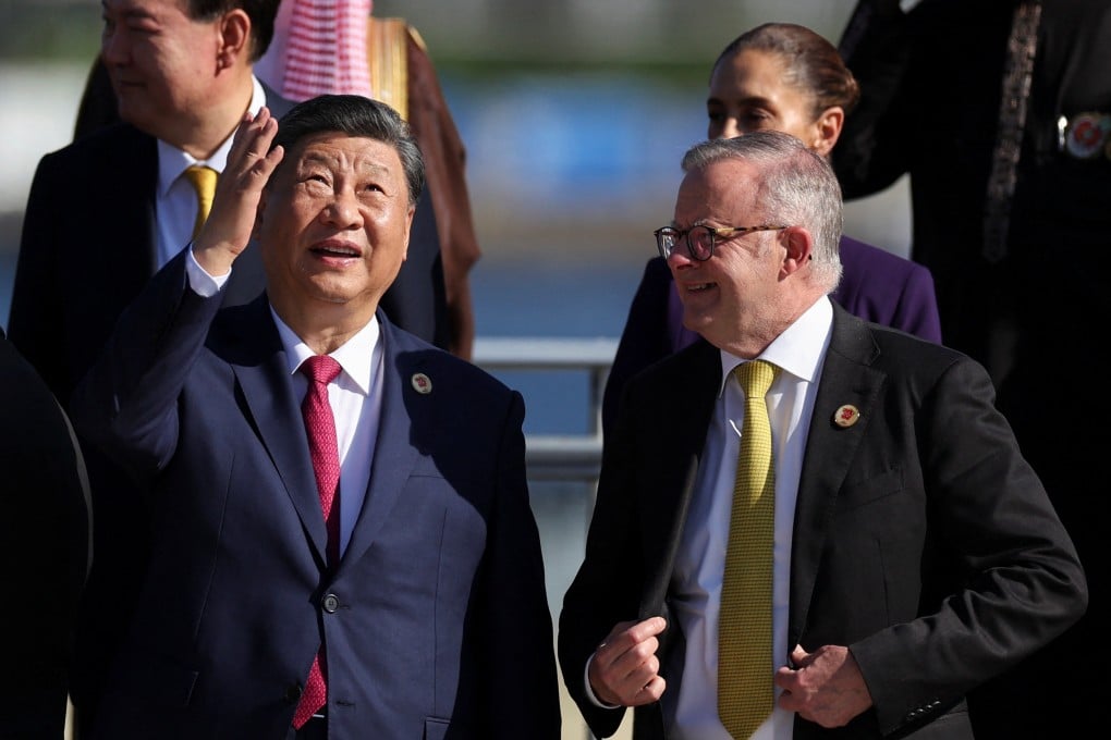 China’s President Xi Jinping speaks with Australia’s Prime Minister Anthony Albanese as they prepare for a group photo with other leaders during the G20 summit in Rio de Janeiro, Brazil, November 18, 2024. Photo: Reuters