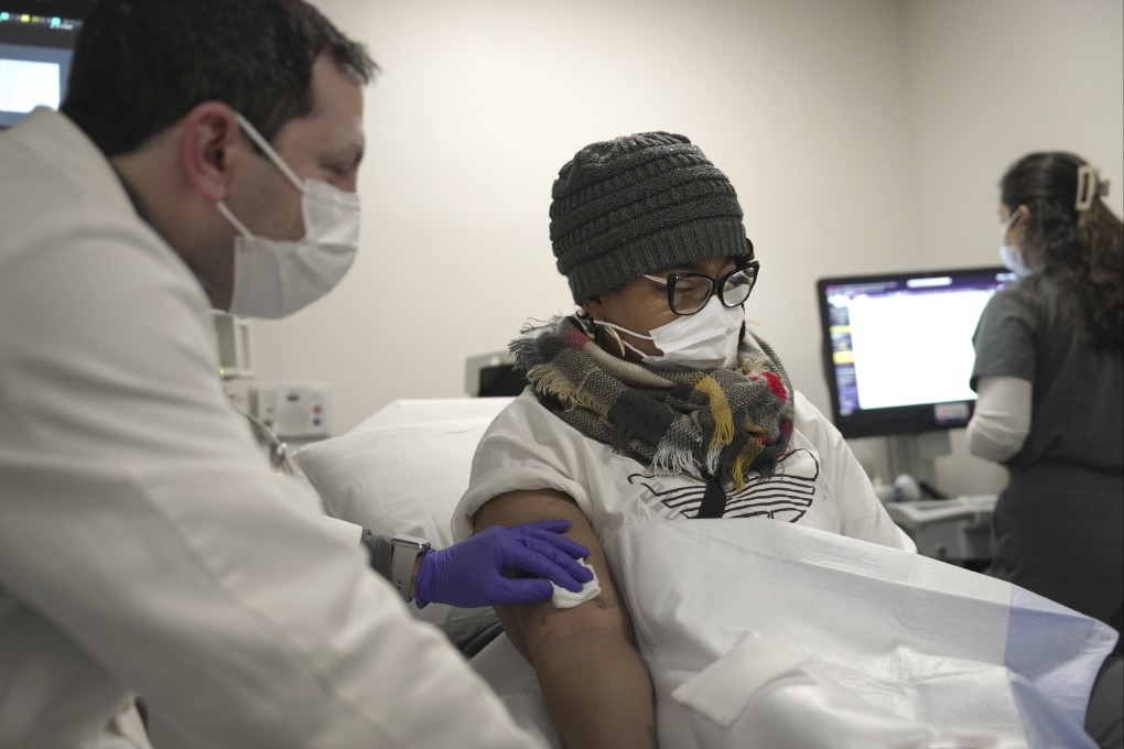 Towana Looney, a pig kidney transplant recipient, gets a morning check-up with Jeffrey Stern at NYU Langone Health in New York in January. Photo: AP