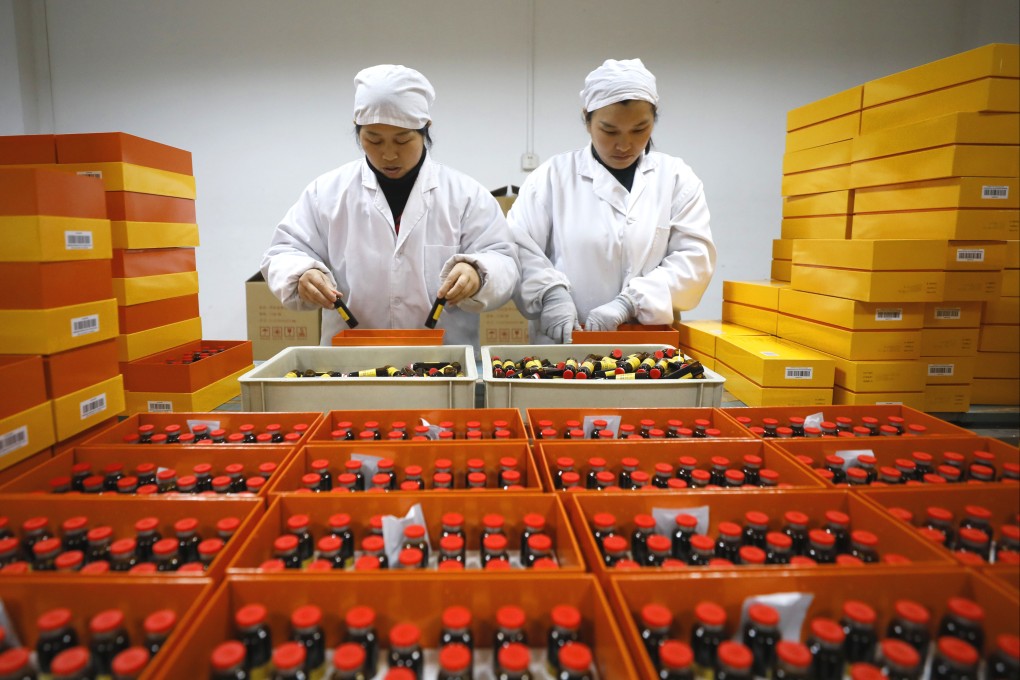 Employees of Jiangxi Banbiantian Pharmaceutical pack medicines at the company’s plant in Jiangxi province. Photo: VCG via Getty Images