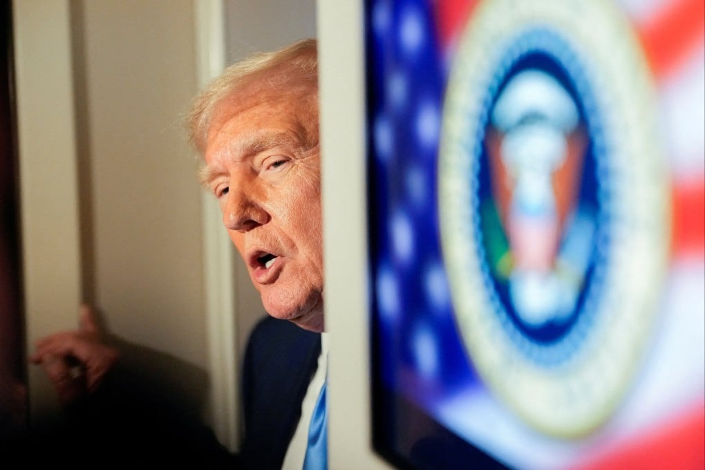 US President Donald Trump talks to members of the press on April 6, 2025. Photo: Reuters