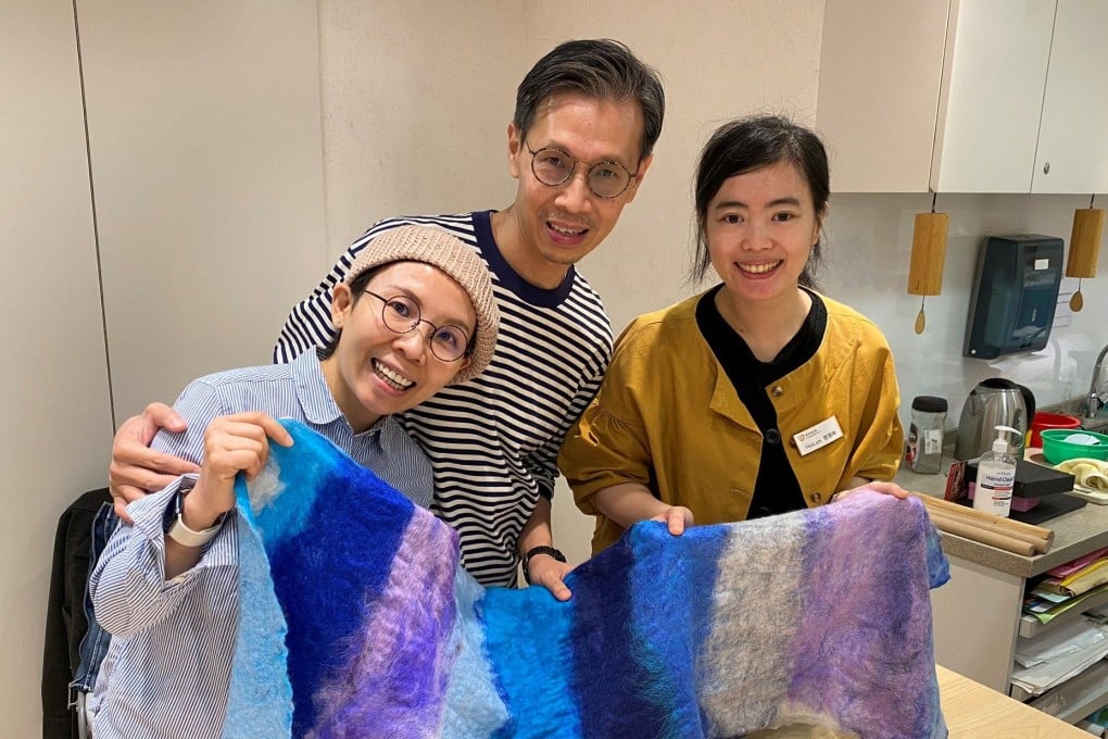Ivy Ip (left) and husband Kenneth Kwan, together with Hong Kong Cancer Fund art therapist Tang Hoi-lam, display a wool-felt scarf they made together at a couples’ art therapy session. Photo: Courtesy of Ivy Ip