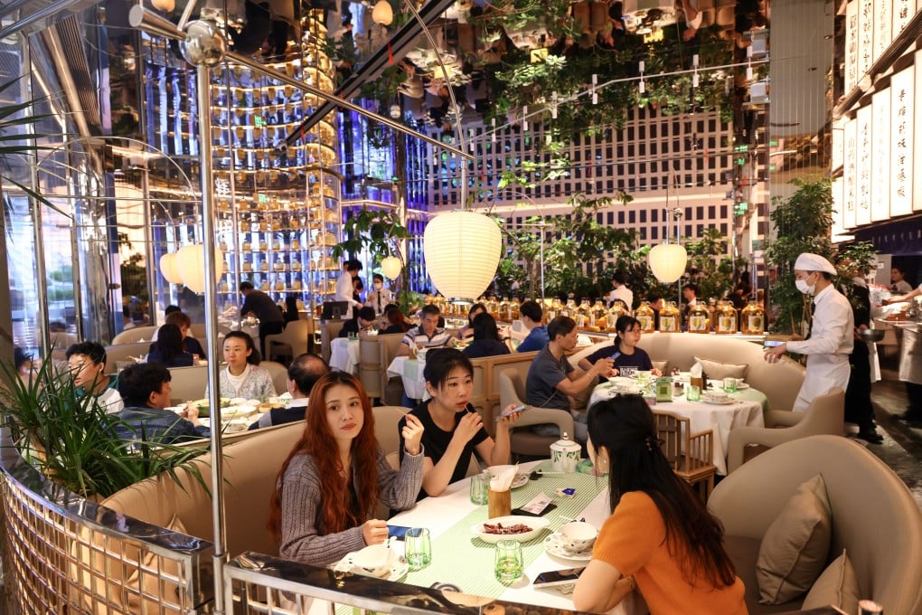 Diners at a restaurant in COCO Park shopping centre in Shenzhen. Photo: Dickson Lee