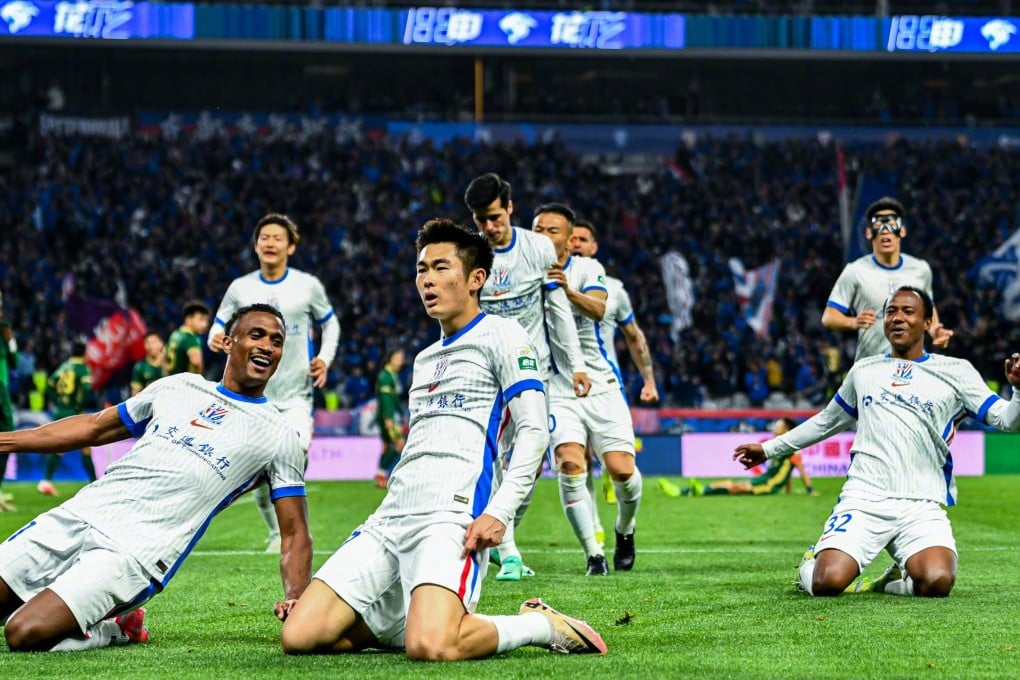 Shinichi Chan (front, right) celebrates after scoring a winner for Shanghai Shenhua in the eighth minute of stoppage time.Photo: WEIBO/ Shanghai Shenhua