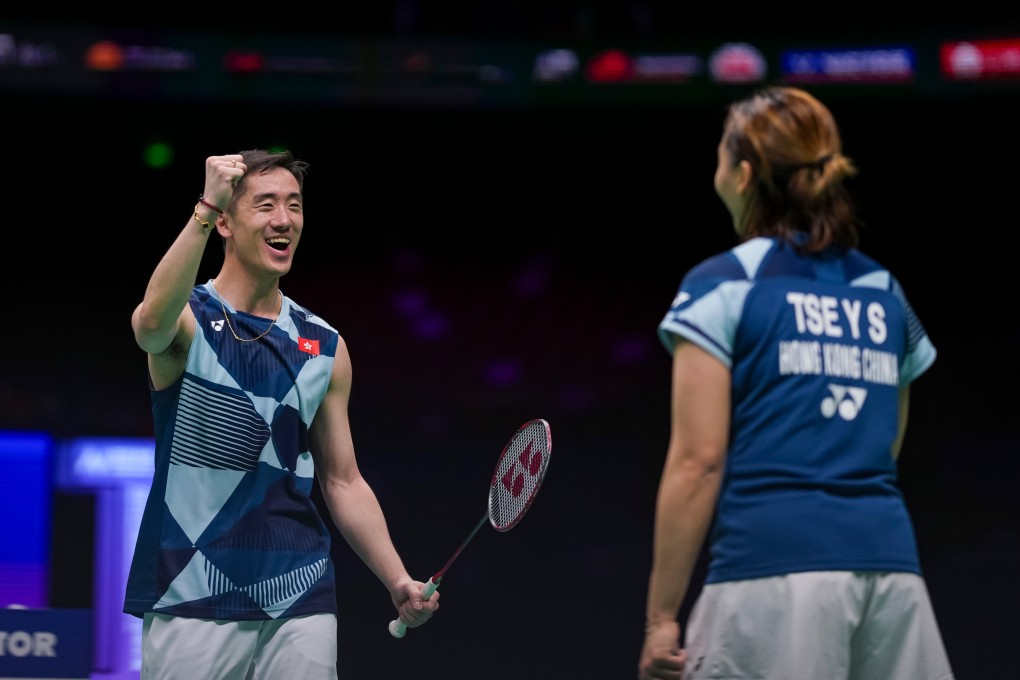 Hong Kong pair Tang Chun-man (left) and Tse Ying-suet celebrate after their stunning victory in the mixed doubles semi-final. Photo: Xinhua