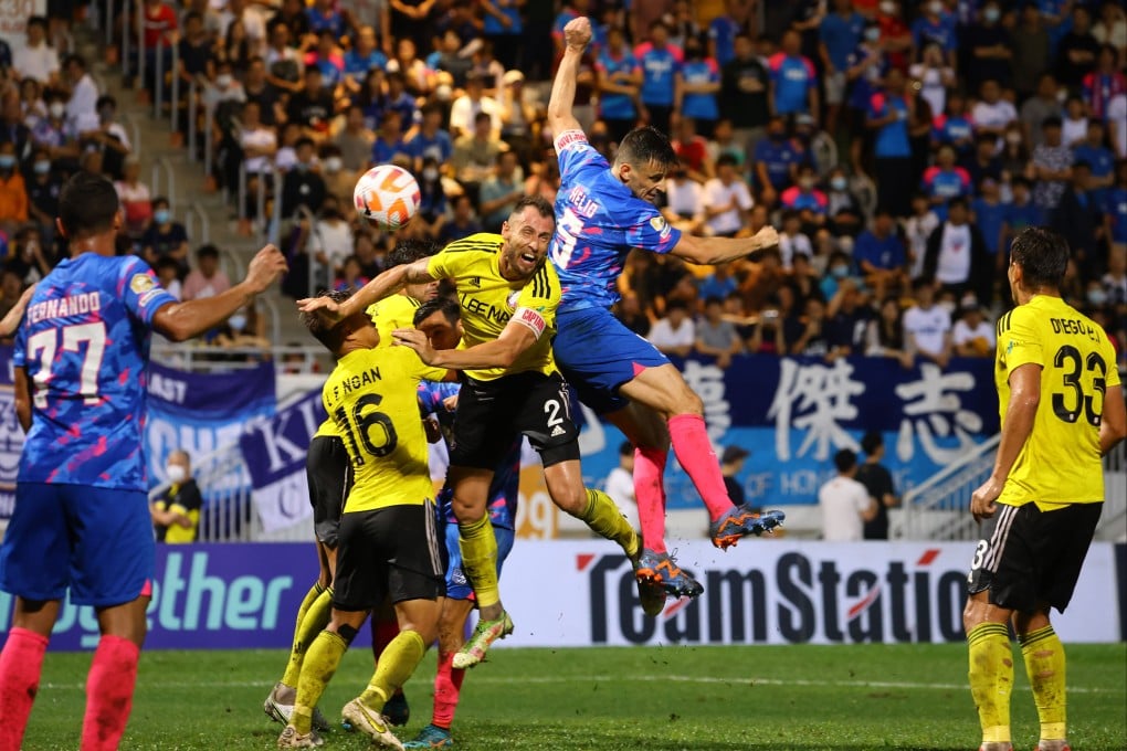 Helio Goncalves leaps highest during happier times, when Kitchee drew with Lee Man on the closing day of 2023-23 to win the title. Photo: Dickson Lee