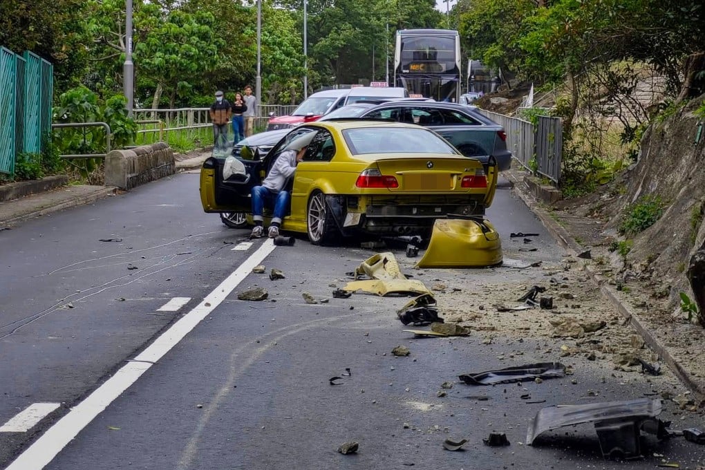Two people were injured after a sports car veered out of control striking a hillside barrier along the single-lane Tai Tam Road towards Shek O. Photo: handout