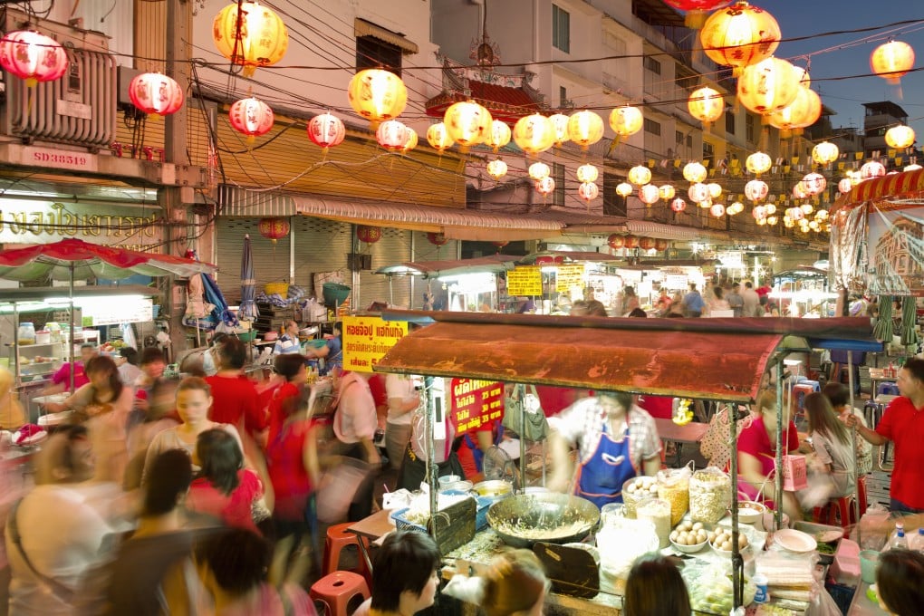Food hawker stalls serve customers during Chinese New Year in Bangkok’s Chinatown in Thailand. Photo: Getty Images