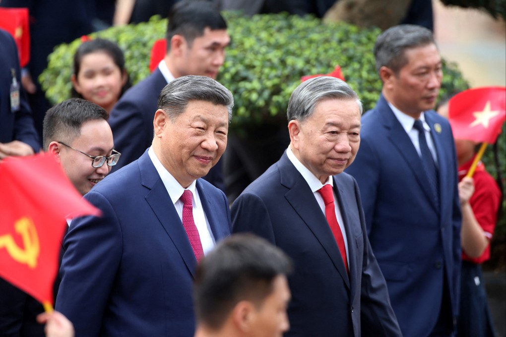 Chinese President Xi Jinping (left) and Vietnamese leader To Lam attend a welcome ceremony at Hanoi’s presidential palace on Monday. During the visit, Xi is expected to cast China as a stable strategic partner. Photo: Reuters