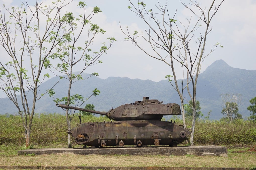 The wreckage of an American tank on display at the Khe Sanh Combat Base in Vietnam. Locations of battles and tunnels are attracting Vietnam war veterans and tourists. Photo: AP
