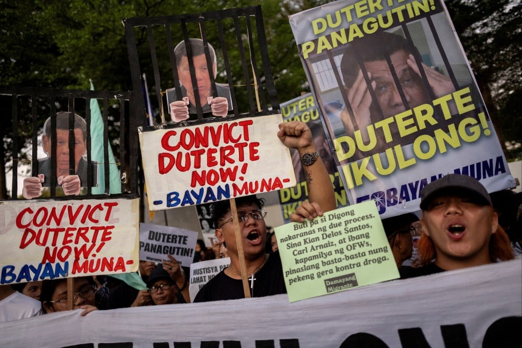 Demonstrators hold placards as Filipino students and activists demand the conviction and imprisonment of former Philippine president Rodrigo Duterte during a protest in Quezon City, the Philippines, last month. Photo: Reuters
