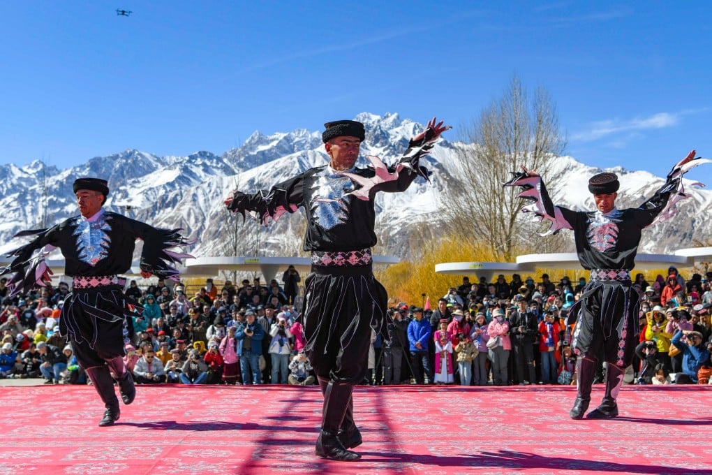 Actors perform an eagle dance in Taxkorgan Tajik autonomous county in western China’s Xinjiang Uygur autonomous region on March 22. Photo: Xinhua