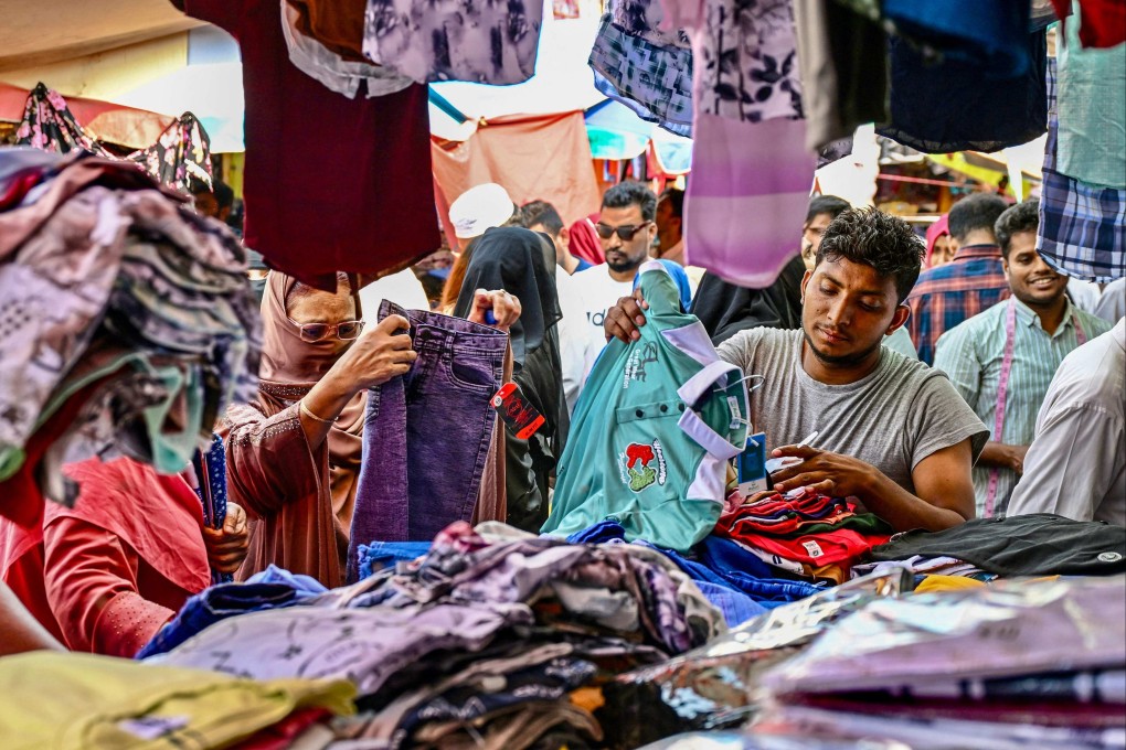 Bangladeshi Muslims buy clothes during Ramadan in Dhaka on March 25. Israel is a flashpoint issue in Muslim-majority Bangladesh. Photo: AFP