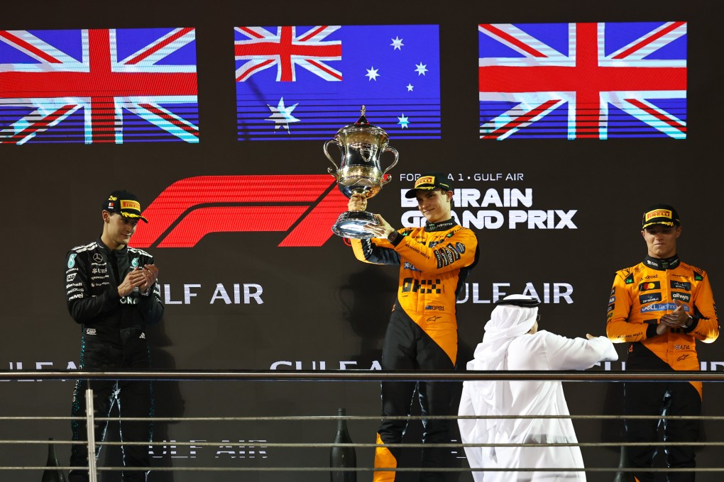 McLaren’s Oscar Piastri (centre) celebrates victory with second-place George Russell (left) and Lando Norris on the podium in Bahrain. Photo: Xinhua
