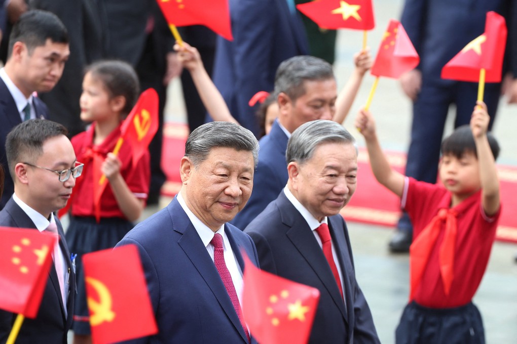 Chinese President Xi Jinping (left) and Vietnamese leader To Lam attend a welcome ceremony at Hanoi’s presidential palace on Monday. During the visit, Xi is expected to cast China as a stable strategic partner. Photo: Reuters