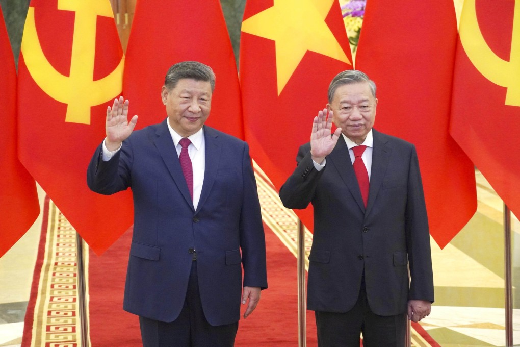 Chinese President Xi Jinping and his Vietnamese counterpart To Lam in Hanoi on Monday. Photo: Kyodo