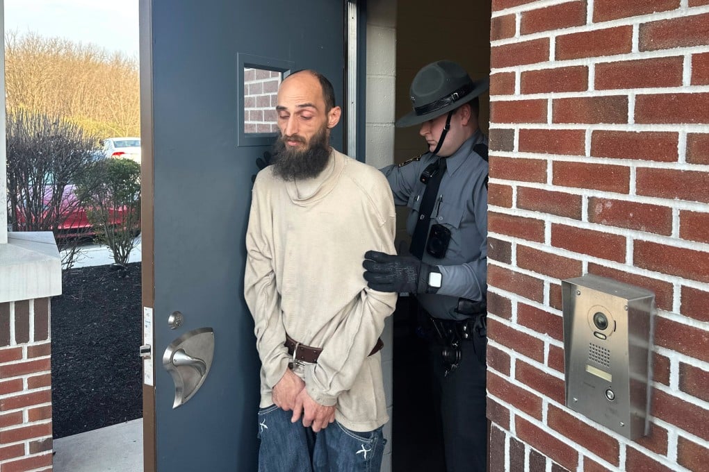 Cody Balmer is taken from a courtroom on Monday in Harrisburg, Pennsylvania after being denied bail for charges including starting a fire at Pennsylvania Governor Josh Shapiro’s home. Photo: AP
