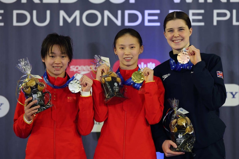 Winner Chen Yuxi (centre) and second-placed Quan Hongchan (left) alongside Andrea Spendolini-Sirieix, who won bronze. Photo: AFP