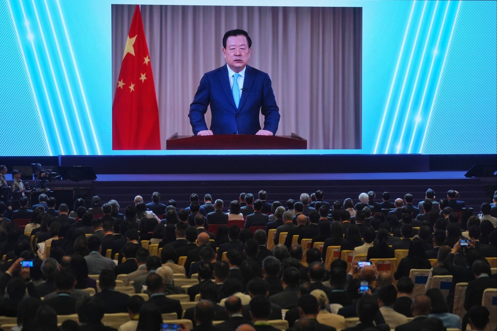 Xia Baolong delivers a speech via video at the 10th National Security Education Day opening ceremony and seminar. Photo: Elson Li