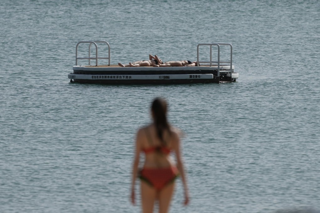 Swimmers catch some rays in Repulse Bay as Hong Kong swelters on the hottest day of the year so far. Photo: Sam Tsang