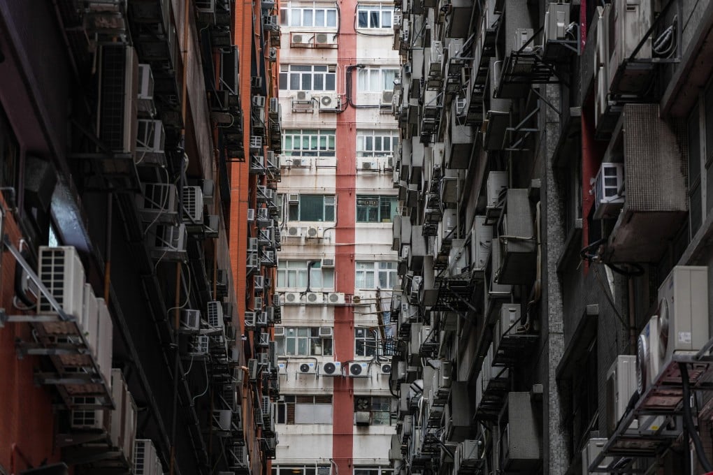 Air-conditioner units mounted on buildings in Kwun Tong. Photo: Eugene Lee