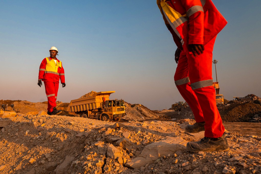 Workers direct traffic at a large copper and cobalt mine in the Democratic Republic of Congo. China has invested heavily in mining projects in the country. Photo: AFP