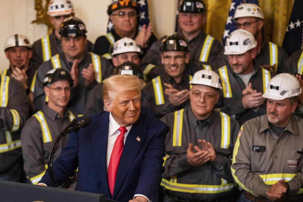 US President Donald Trump signs an executive order to “Make Coal Clean Again,” at the White House in Washington on April 8. Photo: AFP