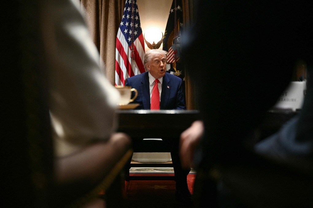 US President Donald Trump in a cabinet meeting on April 10. Photo: AFP
