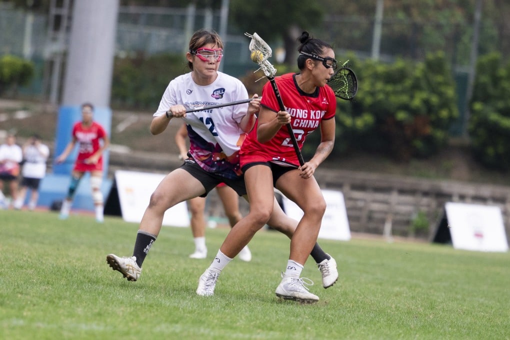 Hong Kong’s Xu Jiaxi (right) in action in last year’s final against against eventual winners Second Era Leaders of Lacrosse (SELL) of Japan. Photo: Hong Kong Lacrosse