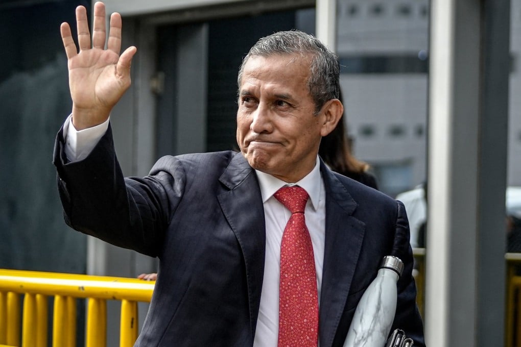 Peru’s former president Ollanta Humala waves as he arrives at the Carlos Zavala Loayza building of Peru’s Judicial Power in Lima, Peru, on Tuesday. Photo: EPA-EFE