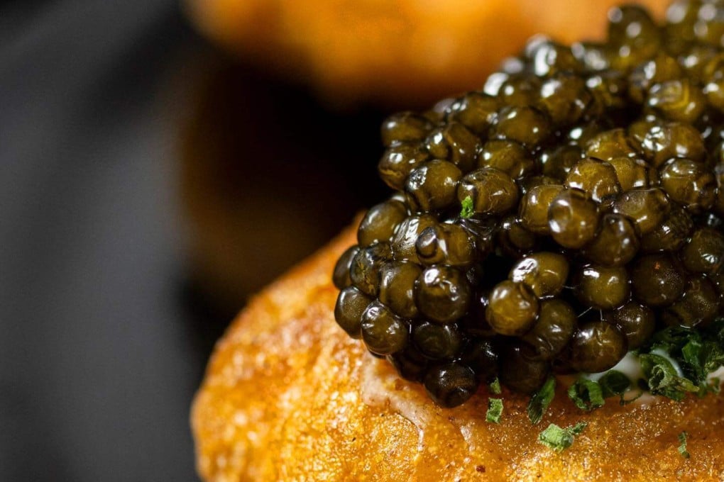 Caviar-topped chicken nuggets at New York restaurant Coqodaq. Chefs in the US are using caviar in exciting ways to draw customers as Chinese producers make it cheaper. Photo: Instagram/coqodaq