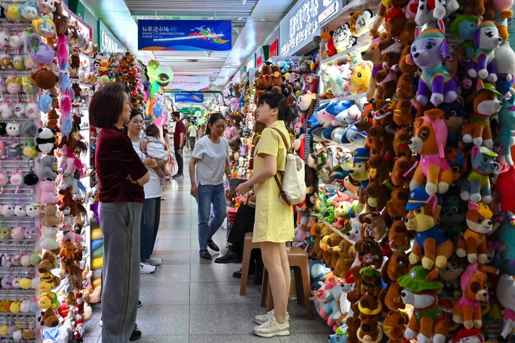 Vendors and buyers are seen at the Yiwu International Trade Market in China’s Zhejiang province on Thursday. The nation’s retail sales rose by 5.9 per cent in March, year on year. Photo: AFP