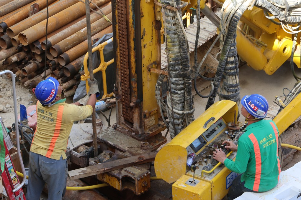 Workers operate large machinery at a building site in Central. Hong Kong’s ombudsman has looked into over 70 construction incidents in an investigation that was its biggest in years. Photo: Jelly Tse