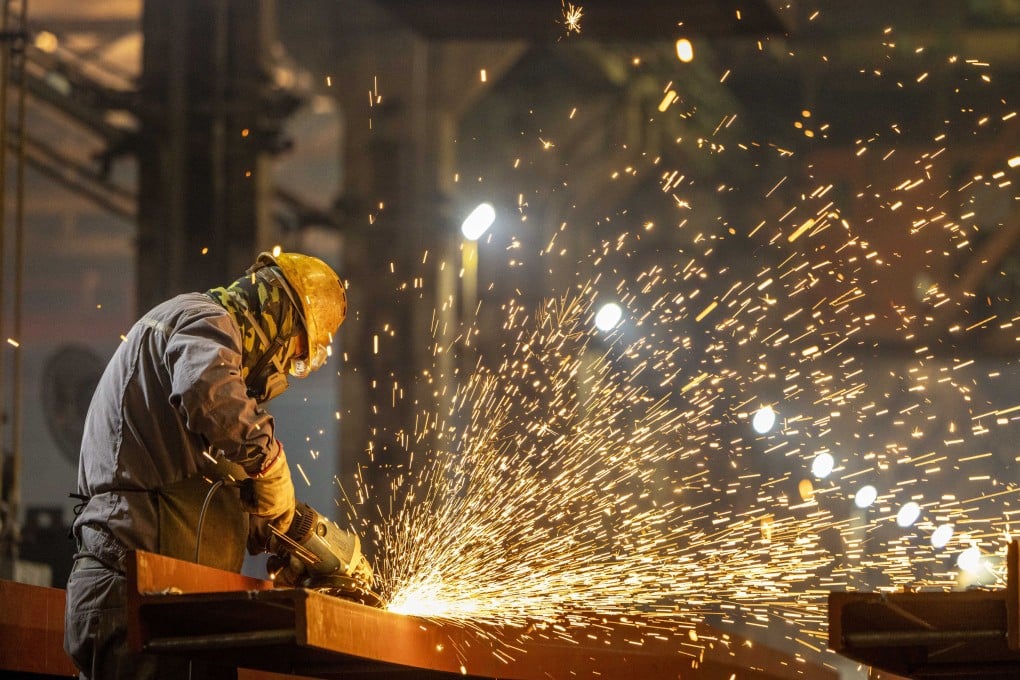 A worker is seen at CRRC Qiqihar Co. Ltd. in China’s Heilongjiang province, April 16, 2025. The country’s economy beat expectations according to the latest figures. Photo: Xinhua